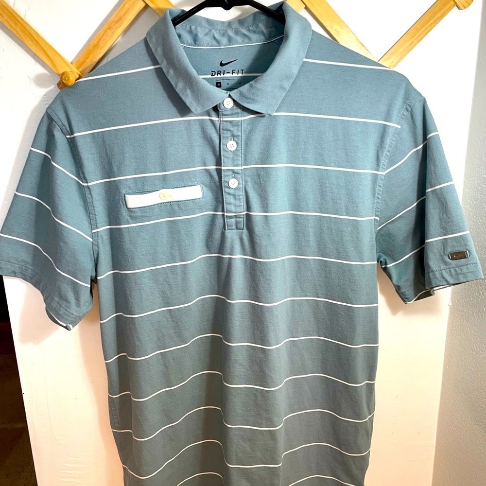 Nike Dri Fit pro golf polo with chest pocket.